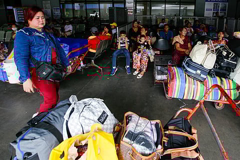 Travellers at the Northport Passenger Terminal