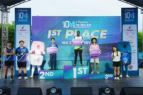 EVANS Bomer celebrates on top of the medal podium after ruling the men’s division of the Rexona 10 Miler Series 2026 Pasay leg on Sunday.