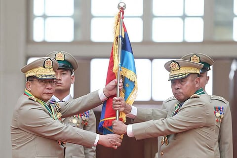 MYANMAR’S outgoing military chief Min Aung Hlaing (left) and his successor Ye Win Oo during a handover ceremony in Naypyidaw. 
