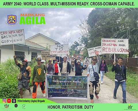 Former rebels (FRs) and residents of Barangay Ibona led by Barangay Chairman Ricardo Balala Jr., held an indignation rally rejecting insurgency in the province of Aurora at the town of Dingalan on March 29, 2026.