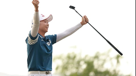 Kim hangs tough, bags LPGA Ford title