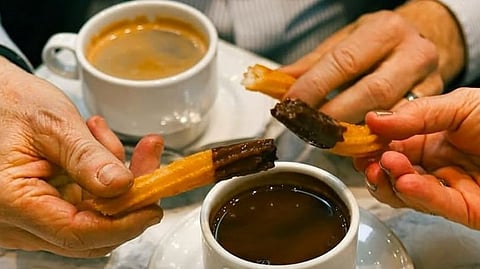 FRESHLY made churros dipped in rich chocolate are served at San Ginés, set to open at SM Podium, bringing a taste of Madrid to local diners.