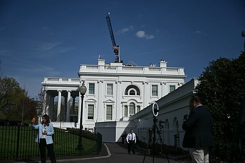 A crane works on the planned White House ballroom as a federal judge ordered construction stopped, saying President Donald Trump lacked authority to demolish the historic East Wing without congressional approval. Judge Richard Leon wrote that while Trump is steward of the White House, he is not its owner.