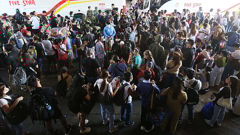 Passengers heading to their respective provinces for Holy Week flock to the Five Star Bus terminal in Quezon City on Holy Wednesday, 1 April.
