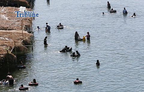 (April 03 2026)  Families enjoy swimming in the running waters of the Sta. Lucia River in Angat, Bulacan, on Good Friday April 3 2026. Photo/Analy Labor
