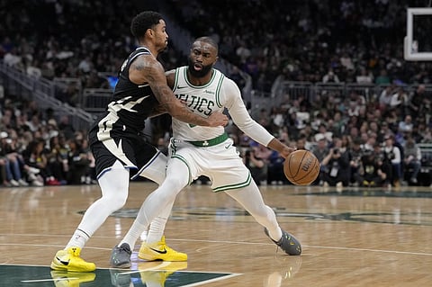 JAYLEN Brown posts 26 points as the Boston Celtics roll to a 122-101 rout of the Milwaukee Bucks in the NBA. 