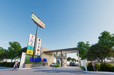NEXTASIA Barcelona, a 22-hectare township development in San Pablo City, Laguna, featuring a modern gate, landscaped spaces and commercial components.