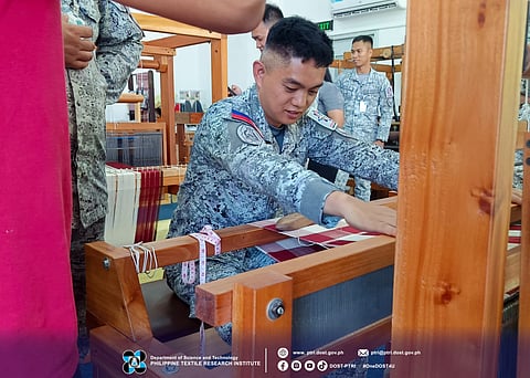 A PHILIPPINE Air Force personnel learn weaving using a traditional equipment during a textile course hands-on conducted by the DoST’s Philippine Textile Research Institute at the Innovation Center for Yarn and Textile on 25 to 26 March 2026. 
