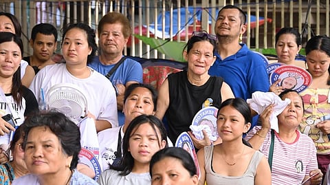 RESIDENTS in Marikina City who fell victims to a recent blaze receive aid from the team of Senator Christopher 'Bong' Go.