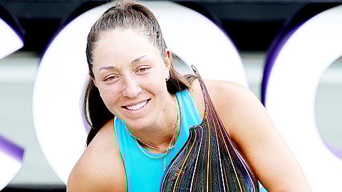 JESSICA Pegula celebrates with her dog, Maddie, after winning the Charleston Open at the Credit One Stadium in Charleston, South Carolina. 