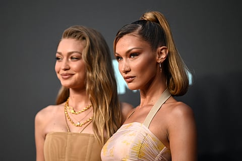US models Gigi Hadid (L) and Bella Hadid arrive for the 2019 MTV Video Music Awards at the Prudential Center in Newark, New Jersey.