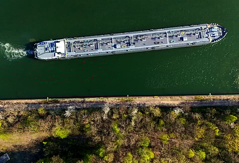 AN aerial view shows a tanker near the fuel depot of Aral at the Ruhr Oel petroleum refineries of BP Gelsenkirchen GmbH in Gelsenkirchen, western Germany on 7 April 2026. Oil prices plunged by more than 17 percent after the Middle East ceasefire announcement, while European natural gas dropped 20 percent in early trade Wednesday in Asia.