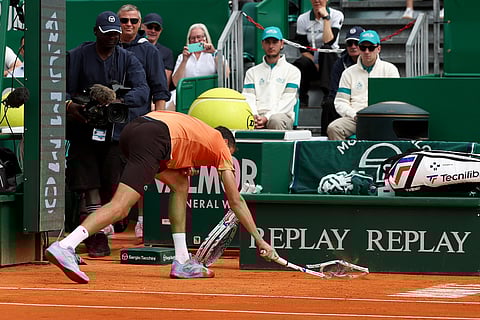 DANIIL Medvedev smashes his racket after suffering a 0-6, 0-6 loss to Matteo Berrettini in the second round of the Monte Carlo Masters on Thursday.