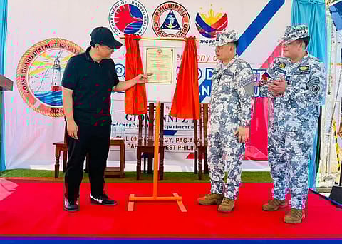 Department of Transportation Secretary Giovanni Lopez joins officials from the Philippine Coast Guard during the inauguration of the new Coast Guard District in the Kalayaan Island Group.
