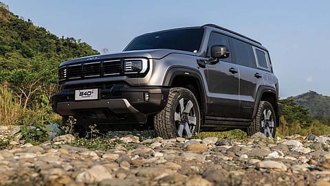 A LOW angle view highlights the B40e rEV’s stance and four-wheel drive capability on uneven ground.