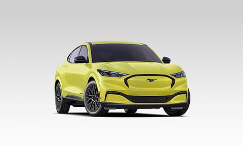 THE B40e rEV sits on rough terrain, showing its body-on-frame build and off-road focus.