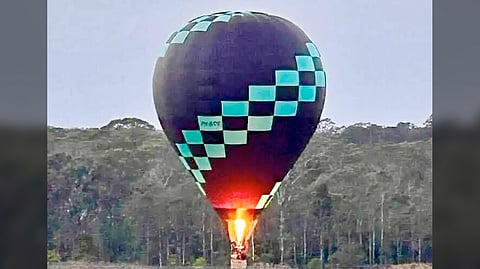 THE hot air balloon slowly descends over Hunter Valley’s vineyards after a scenic sunrise flight.