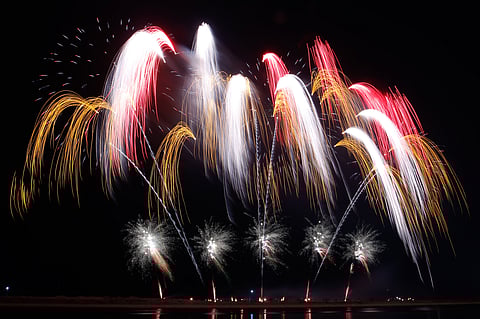 Spain's Hermanos Caballer paints the Manila Bay night skies during the fifth and final week of the Philippine International Pyromusical Competition at the SM Mall of Asia, Pasay City, on 11 April 2026. The United Kingdom's Pyrotex Fireworks Ltd. was crowned this year’s Grand Champion, followed by China's Liuyang Polaris Fireworks Co. Ltd. in second place, and Germany's Steffes-Ollig Feuerwerk rounding out the podium.