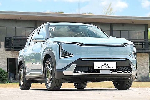 THE Kia EV5 shows its Digital Tiger Nose front and LED lighting during its MIAS debut.
