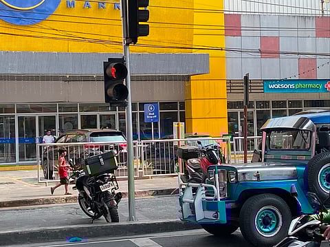Jeepney drivers remain cautious despite fuel price rollback, with some halting trips and others relying on passenger support to cope with rising costs.