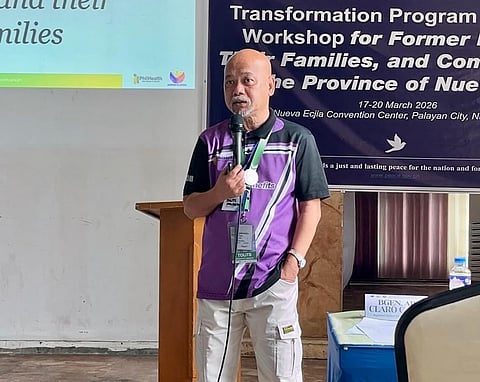 Angelito Creencia, chief social insurance officer of PhilHealth Local Health Insurance Office in Gapan City, explains the benefits of the PhilHealth on Wheels program during a workshop on the Transformation Program in Nueva Ecija. He highlighted the initiative’s efforts to facilitate free registration for health insurance for former rebels and their families.