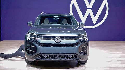 VOLKSWAGEN pivots to its gas-powered SUV as electric demand cools. 