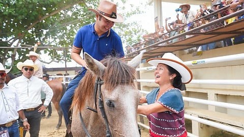 PRESIDENTIAL son Vincent ‘Vinny’ Marcos, atop a horse, shares a cowboy moment with First Lady Liza Araneta-Marcos (right) during a celebration honoring Masbate’s cattle industry, in a display of support for the province’s enduring ranching tradition.