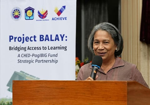 PAG-IBIG Fund chief executive officer Marilene Acosta speaks during the launch of the ‘Project BALAY: Bridging Access to Learning’ program at the Commission on Higher Education auditorium.