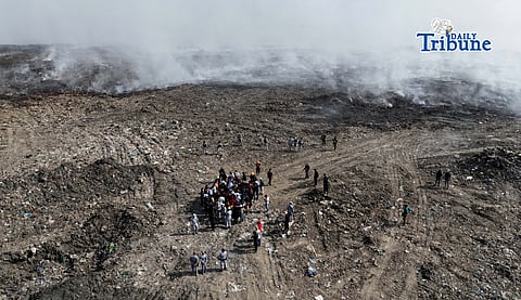 LANDFILL BLAZE FROM ABOVE: An aerial view of the Navotas Sanitary Landfill on 16 April 2026 shows a fire that has been burning for days, affecting nearby communities in Navotas, Malabon, and Obando, Bulacan. Photo by Analy Labor.
