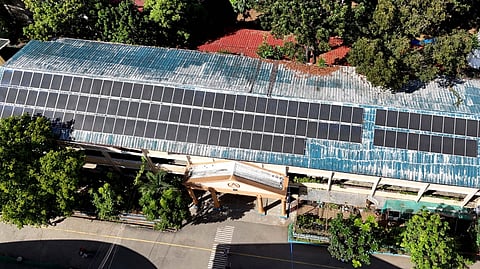SOLAR panels crown the rooftops of three buildings at Commonwealth High School in Quezon City,  turning harsh heat into quiet power. As temperatures climb, Education Secretary Sonny Angara pushes schools toward renewable energy, where the sun itself keeps classrooms open and learning uninterrupted.