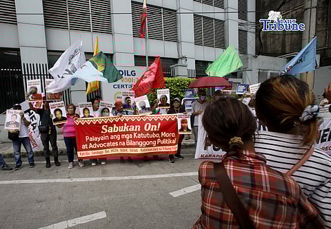 (April 17 2026) Militant group KARAPATAN stage a protest in front of the DILG-NAPOLCOM Center along EDSA corner Quezon Avenue on Friday April 17 2026, 2026, to condemn the surge in arrests, demolitions, and anti-poor policies amid the deepening crisis. Photo/Analy Labor 
