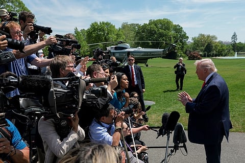 UNITED States President Donald Trump speaks to the media before boarding Marine One on the South Lawn of the White House on 16 April 2026 in Washington, DC. 