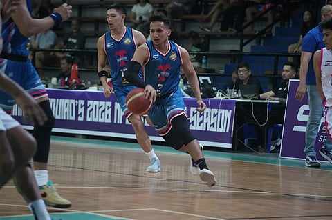 INO Comboy attacks the defense en route to leading the Batangas City Tanduay Athletics to an  85-75 victory over the Bulacan Kuyas in the SportsPlus MPBL 2026 Season at the One Arena in Cainta late Friday. 