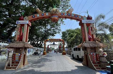 BARANGAY Vega Grande’s arch greets visitors with bold sibuyas motifs and layered indigenous textures.