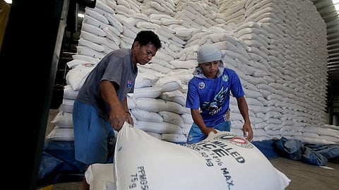 WORKERS at the National Food Authority weigh rice under the P20-per-kilo program of Ferdinand Marcos Jr. at an NFA warehouse in Valenzuela City on 19 February 2026, ahead of distribution to beneficiaries.