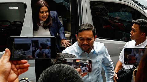SENATORS Mark and Camille Villar arrive at the Department of Justice on Monday for the continuation of the SEC-linked investigation.