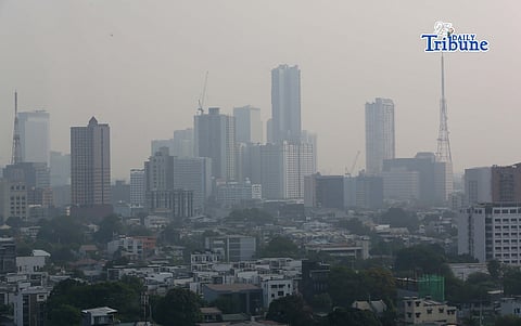 (April 20 2026) Buildings covered a thick smog seen from Quezon City on Monday morning April 20 2026. The Environmental Management Bureau (EMB) logs a very unhealthy air quality in Metro Manila after recording high levels of PM2.5, or the tiny atmospheric particles or droplets which may be inhaled and may cause health concerns, in the air due to numerous factors like vehicle emissions, construction and road dust. Photo/Analy Labor