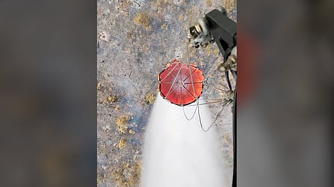 A PHILIPPINE Air Force S-70i Black Hawk helicopter performs a helibucket operation to combat a forest fire over Homonhon Island in Guiuan, Eastern Samar, on Sunday.