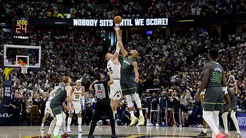 Wolves rally past Nuggets, clinch equalizer