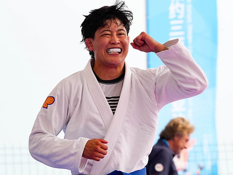 JIU-jitsu bet Alexandria Enriquez celebrates her victory over South Korea’s Yeonji Lee in the final of the women’s 63-kilogram in the sixth Asian Beach Games in Sanya, China. 