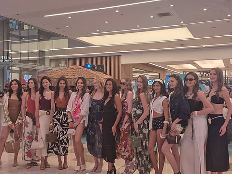ACTRESS Iza Calzado (center) with models showcasing some of SM Woman’s new summer collection.