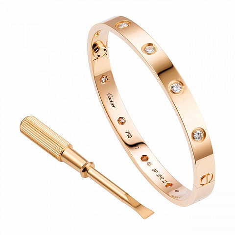 One of the most iconic jewelry pieces in the Cartier collection, the Love bracelet was designed by Aldo Cipullo in 1969, inspred by personal heartbreak