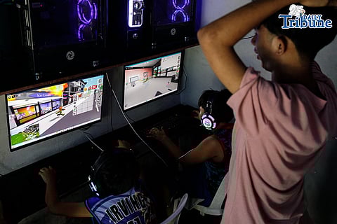 Kids play Roblox at a computer shop in Tondo