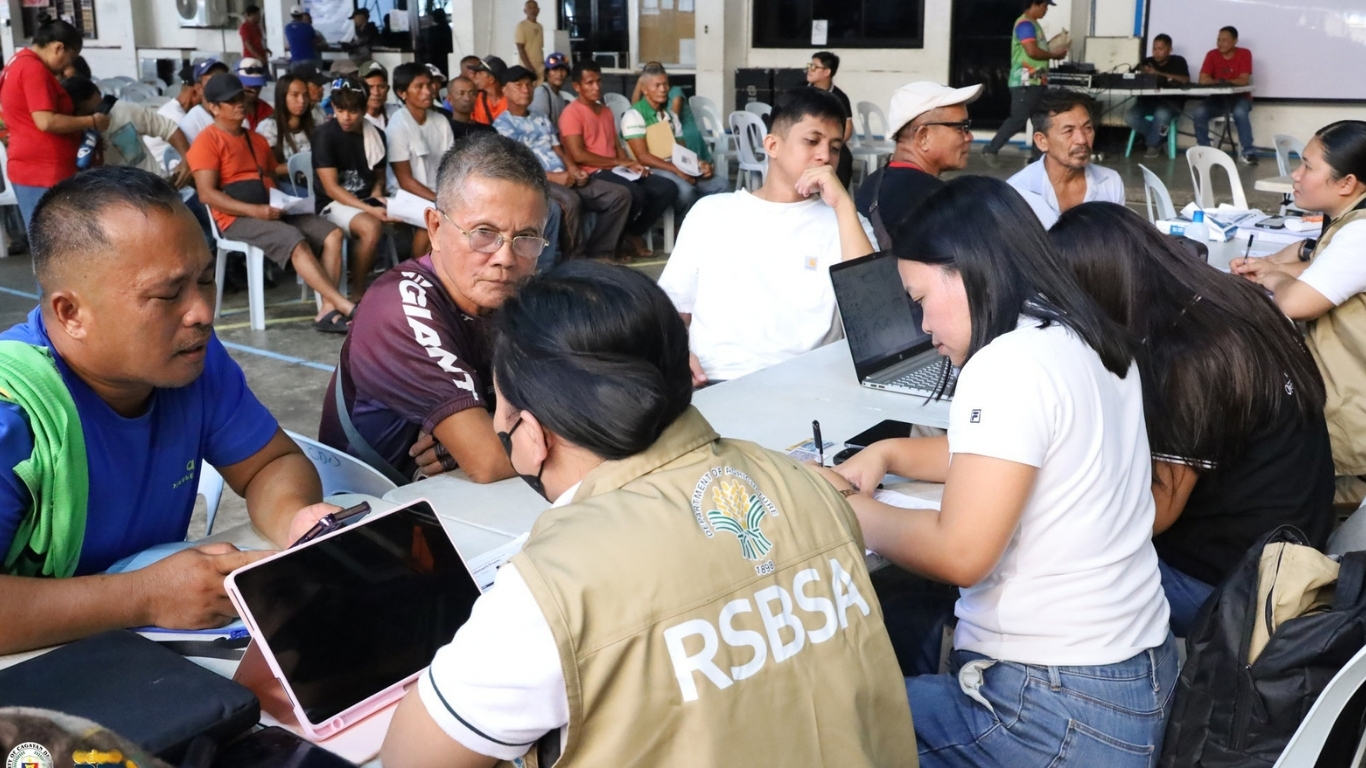 REPRESENTATIVES from the Bureau of Fisheries and Aquatic Resources Region 10 distribute financial assistance to registered small-scale fishers in Misamis Oriental. Amid a 66.4 percent increase in diesel prices, the program provides P3,000 in fuel assistance to operators of motorized bancas to help cushion the impact of rising inflation.