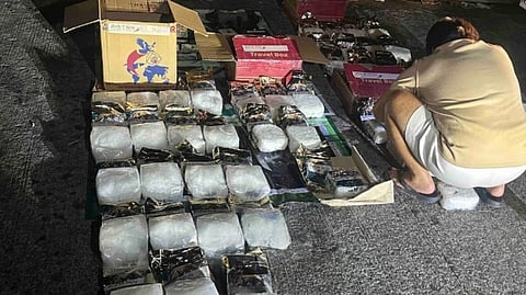 AUTHORITIES conduct inventory of suspected shabu seized from two Chinese nationals arrested in a buy-bust operation in Barangay Balingasa, Quezon City on Tuesday night. More than 41 kilograms of suspected shabu, with an estimated value of P278.8 million, were confiscated during the operation.