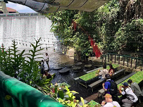 DINING where water flows beneath.