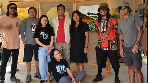 MEMBERS of the Rahmag Art Group with Celentino Dalumpines of the Antique Provincial Tourism Office during the exhibit opening.