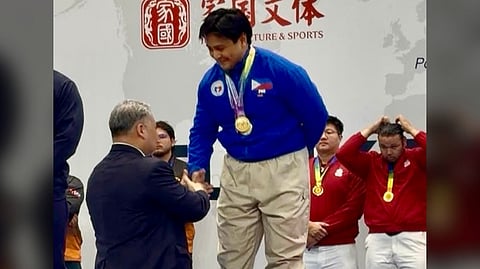 EMILIO Florendo of the Philippines stands atop the podium after winning gold in the 2026 East/Southeast Asia Subregional Powerlifting Championships in Hainan, China.