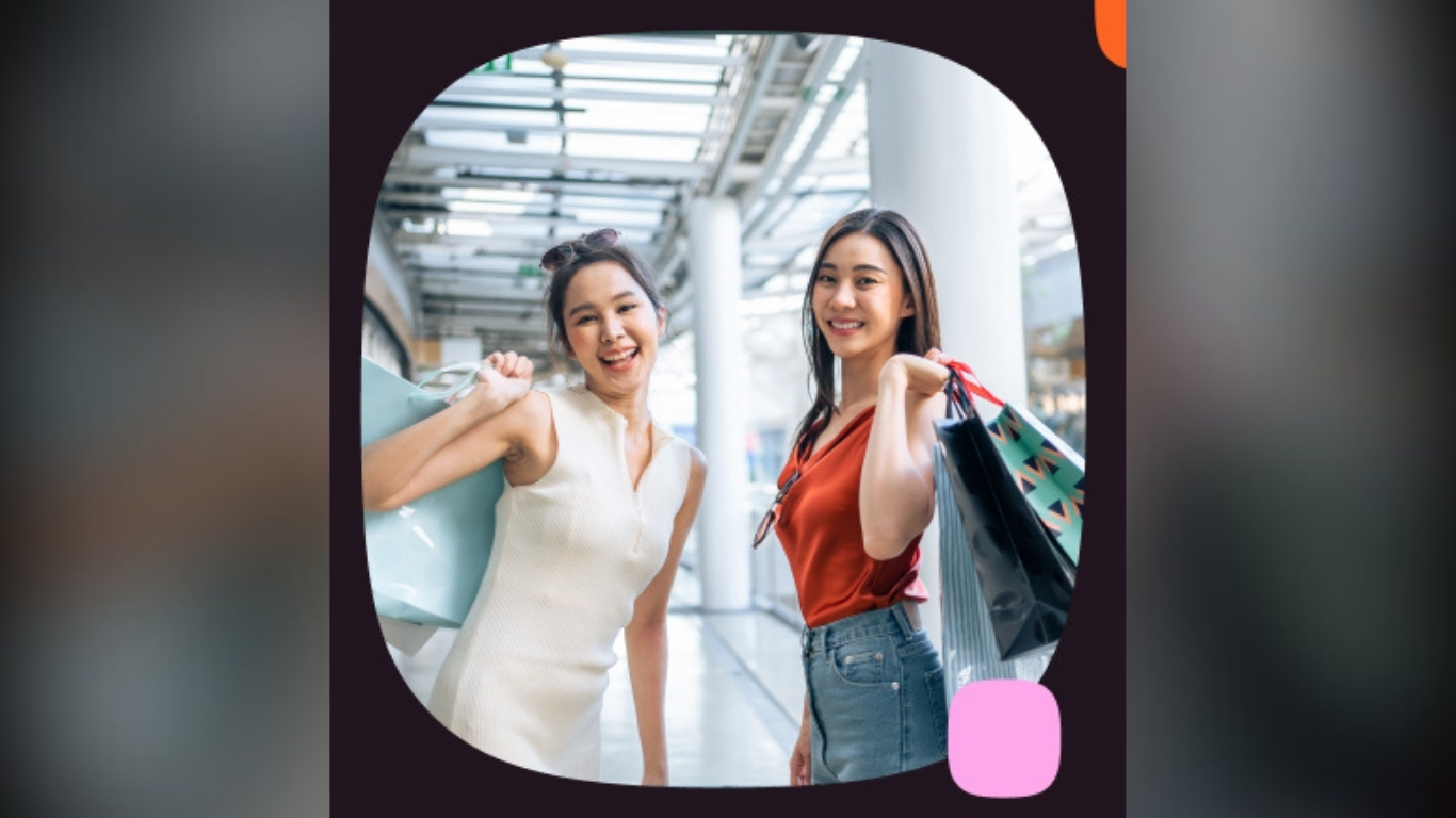 SHOPPERS carry bags inside a mall setting as Infobip partners with SM Supermalls to enhance digital customer engagement through personalized, mobile-first solutions.