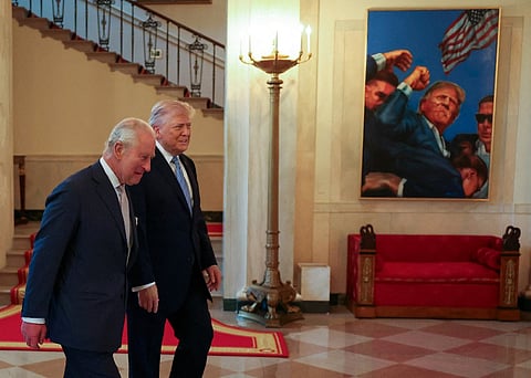 Britain’s King Charles III and US President Donald Trump toured the White House, passing a painting depicting Trump’s 2024 assassination attempt.

